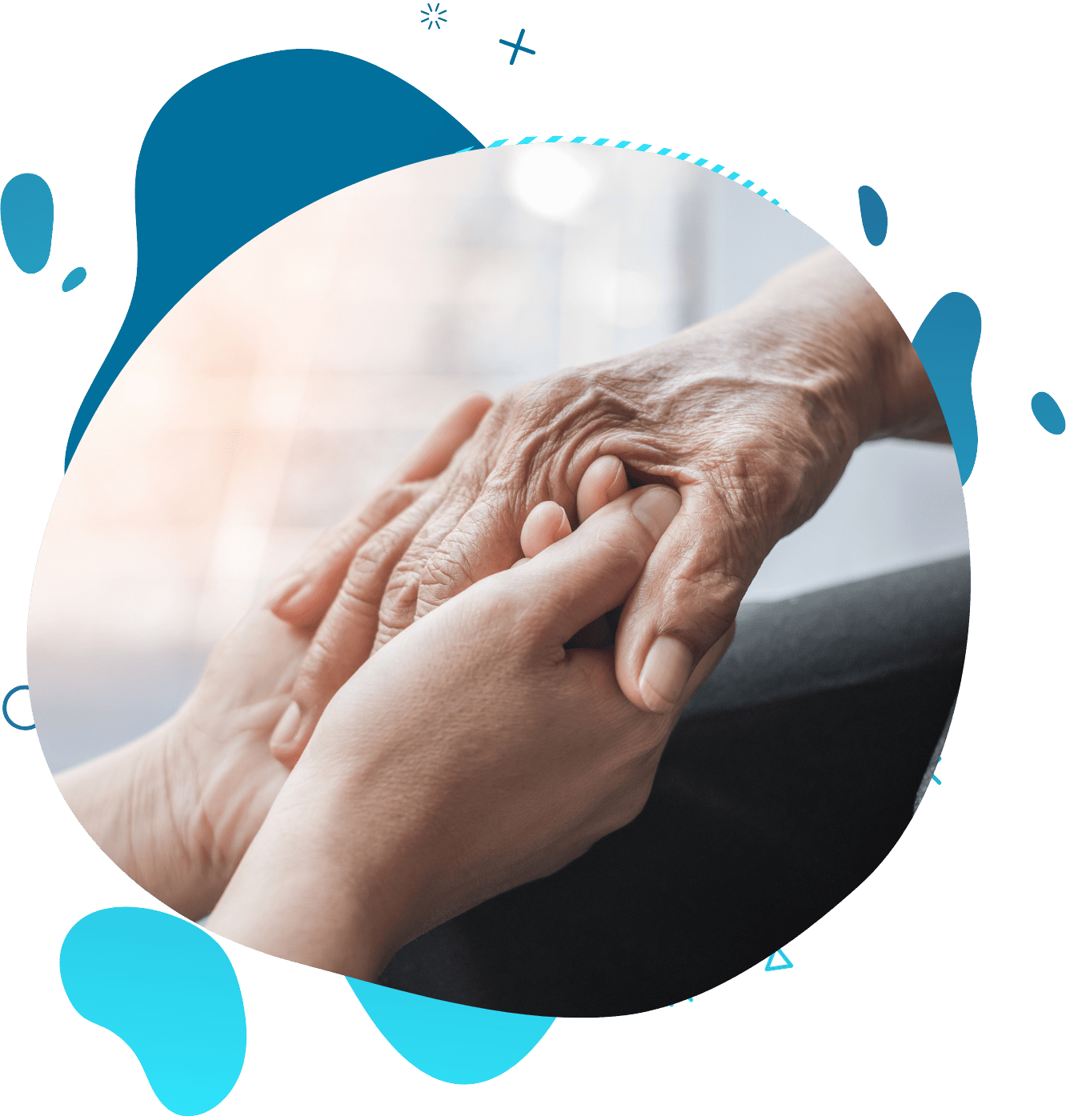 Close-up of young hands of the personal care aide gently holding elderly hands, expressing comfort and support.